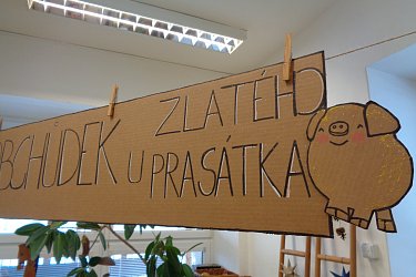 OBCHŮDEK U ZLATÉHO PRASÁTKA